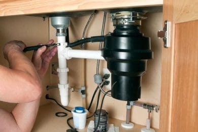 Garbage disposal installation and repair in Monterey, California kitchen